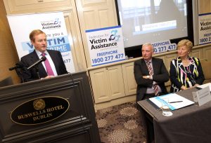 NO REPRO FEE 26/10/2016 Pictured are Taoiseach Enda Kenny TD with Mairead Fernane, Founder and National President of Victim Assistance Ireland, and Michael Bennett, Chairman of the Federation for Victim Assistance, at the launch of the Federation for Victim Assistance’s freephone number 1 800 277477 today at Buswells Hotel, Dublin. The services, which are strictly confidential, include a call back telephone service, face to face meetings, always attended by two members, court accompaniment, onward referral - only with your permission, information on victim impact statements, assistance with forms including criminal Injuries compensation and information on the workings of the Criminal Justice System. The Federation for Victim Assistance is a voluntary organisation structured in County and District Branches around the country. All branches are governed by the constitution of the Federation for Victim Assistance. Their Volunteers are the lifeblood of the organisation and all are fully trained and Garda-Vetted. They offer emotional and practical assistance to all Victims of Crime and Traumatic incidents. The service is also available to Victims' family members. While they do not provide financial assistance the service is free and confidential. PHOTO: Mark Stedman